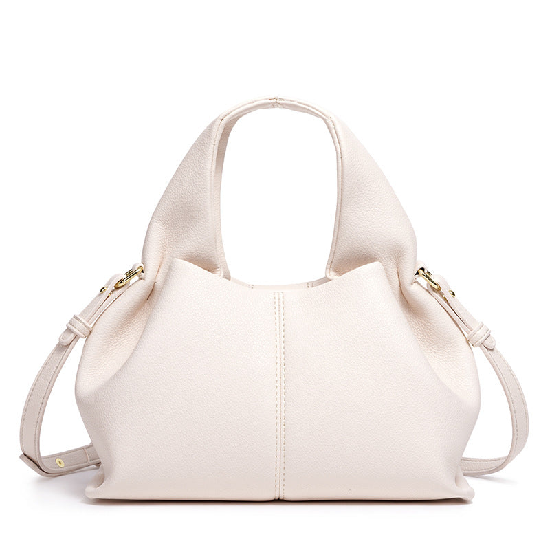 Ladies Cloud Jiaozi Bag New Popular Portable Lunch Box Bag French Texture Shoulder Slung Bag.
