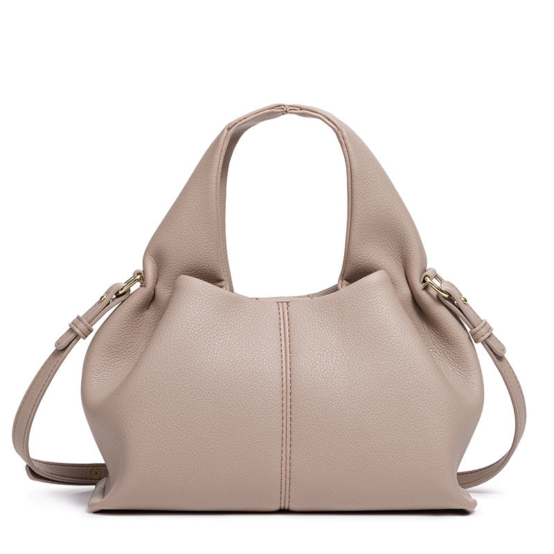 Ladies Cloud Jiaozi Bag New Popular Portable Lunch Box Bag French Texture Shoulder Slung Bag.
